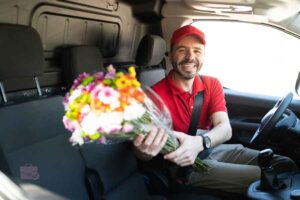 conductor de camioneta para transportar flores de un vivero